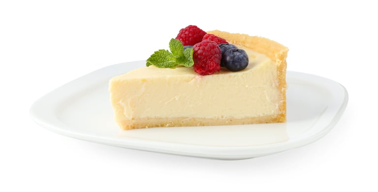 Birthday cheesecake with berries and mint